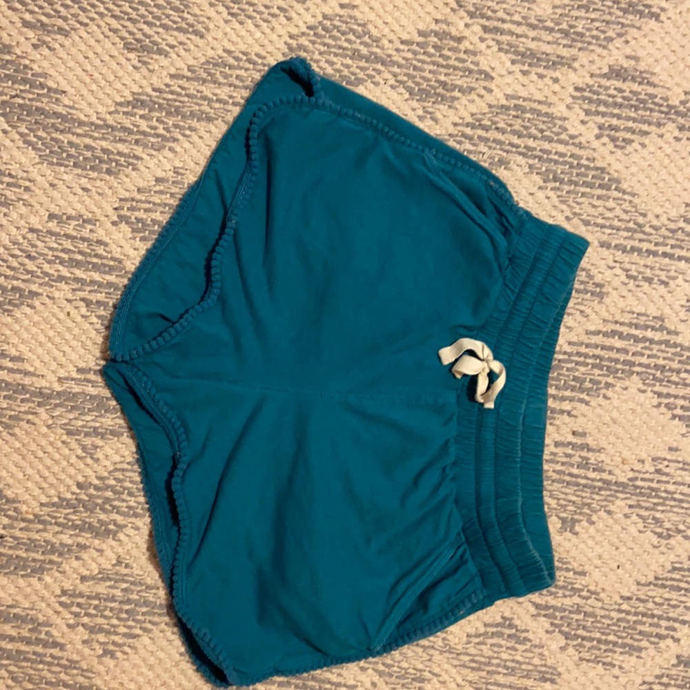 turquoise shirts girls size 12. in perfect condition